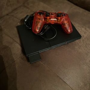 PS2 Slim with all cord. Comes with remote and NCAA Football Game and 8MB Card